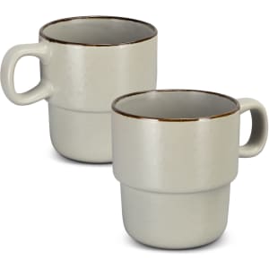 A set of two stackable coffee mugs in a muted grey colour with a brown rim and a modern design.