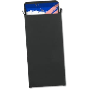 A small black gift box containing assorted hazel chocolates with a colourful wrapper. The box has a branded logo.