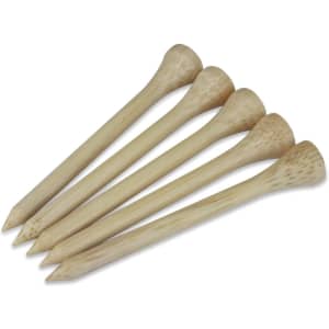 A set of five wooden golf tees, each with a tapered point and a wider base, arranged side by side.