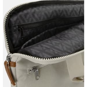 A beige laptop bag with a lined interior and zippered compartments. It features a light grey pattern inside.