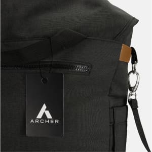 A dark grey messenger bag featuring a zippered pocket, a clip attachment, and a logo.