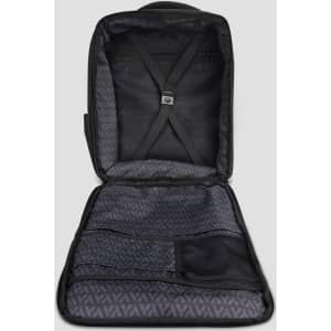 An open black travel backpack with multiple compartments and a patterned inner lining. It features adjustable straps inside.
