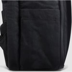 A black travel backpack featuring a textured exterior and side pocket. It has a logo on the front.