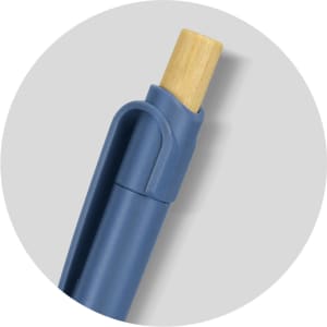 A blue recycled plastic pen with a wooden tip and a clip for attachment. It features a simple, modern design.