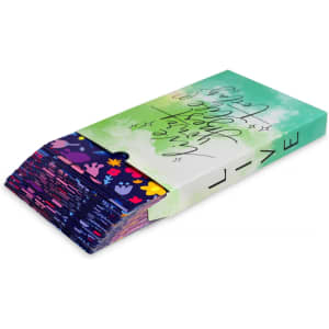 Custom Jumbo Cards in a vibrant green and purple design, stacked in a fan display with various playful patterns.