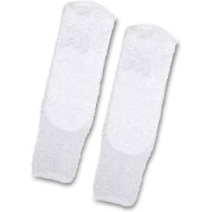 Fluffy white grip socks with a textured surface, featuring a logo on one side.