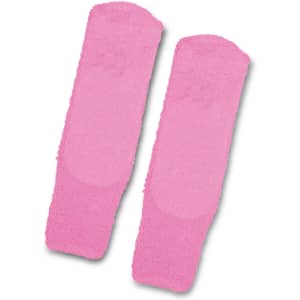 Soft, fluffy grip socks in a vibrant pink shade, featuring a textured design for added grip.