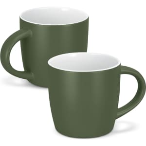 A green mocha coffee mug with a smooth exterior and a white interior, featuring a handle and a logo.