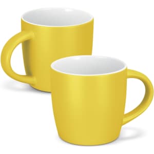 Two yellow coffee mugs with a smooth finish and white interiors, featuring a handle and a simple design.