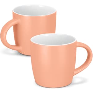 A drinkware set featuring two mocha-coloured coffee mugs with smooth, rounded shapes and white interiors.
