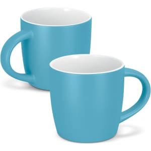A drinkware set featuring two turquoise coffee mugs with white interiors and round handles.