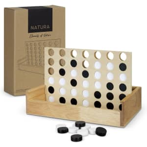 A wooden four-in-a-row game in a natural finish, with black and white discs, alongside its box featuring a logo.