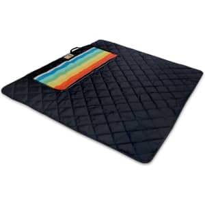 A large navy picnic blanket with a rainbow-striped pocket and a quilted design. It features a carrying handle.