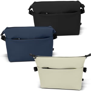 A toiletry bag in black, navy, and cream, featuring multiple compartments and a logo.