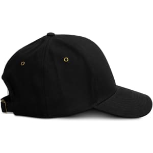 A black cap with a curved brim, featuring ventilation eyelets and an adjustable strap at the back.