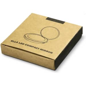 A brown cardboard box containing the Ella LED Compact Mirror, featuring a simple round design.