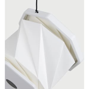 A white, foldable lantern with a geometric design, featuring a hanging string and a logo on the base.