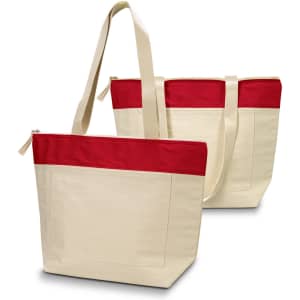A cotton tote with a cream body and red accents, featuring two sturdy handles and a zippered closure.