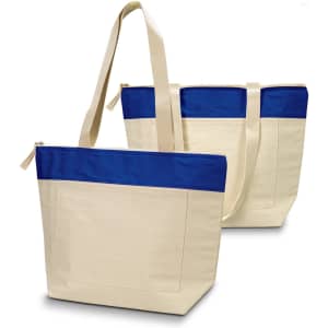 A beige cotton tote bag with a blue panel at the top, featuring long handles and a zip closure. Branding visible.