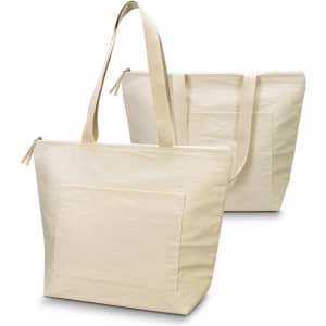 A cream-coloured cooler tote bag with a single strap and a large front pocket, featuring a logo.