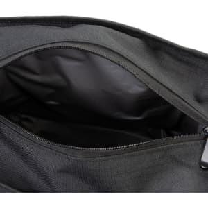 A black cooler bag with a zippered opening, revealing a spacious, insulated interior.