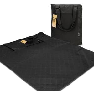 A black picnic blanket folded with a matching carrying bag. The blanket features a quilted pattern.