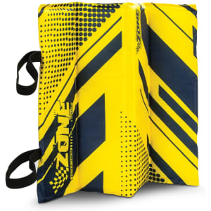 A foldable stadium cushion in bright yellow and navy, featuring a bold geometric design and carrying straps.