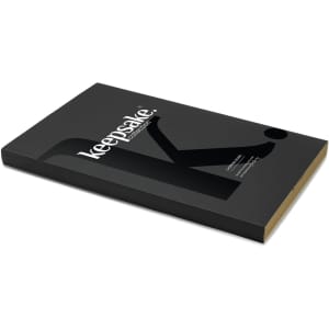 A black chopping board with a gold edge, featuring a logo on the surface.