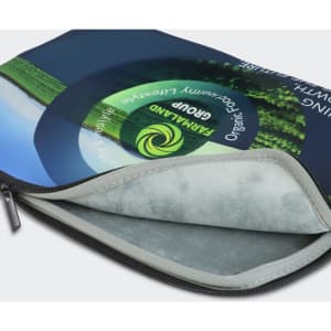 A small, full-colour laptop sleeve featuring a vibrant design and a soft interior lining, with a logo present.