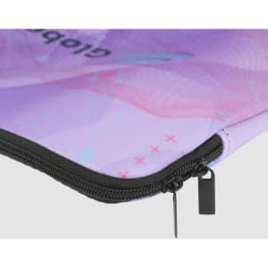 A large laptop sleeve in shades of purple with a stylish pattern and a black zip. It features a logo.