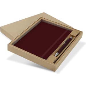 A maroon notebook and pen gift set displayed in a cardboard box. The set features a sleek pen alongside the notebook.