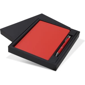 A red notebook and pen gift set housed in a sleek black box with a branding logo.
