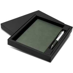 A green notebook and pen set presented in a black gift box, featuring a simple design and a brand logo.