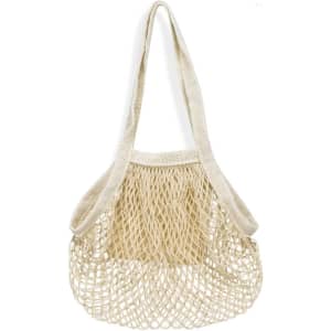 A small cotton mesh tote bag in a natural beige colour, featuring a woven design and a single shoulder strap.