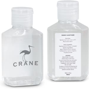 A clear, rectangular bottle of hand sanitiser gel, featuring a logo and a white flip-top cap. Contains 60ml.