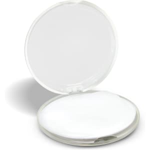 A round, transparent hand soap travel case, featuring a white soap disc inside.