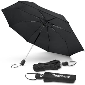A black umbrella with a metal frame, featuring a branded storage pouch and a built-in handle.