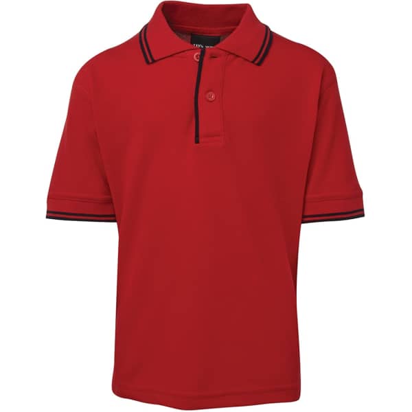 A red kids' polo shirt with contrasting navy collar and sleeve trims. It features a button placket and a logo.
