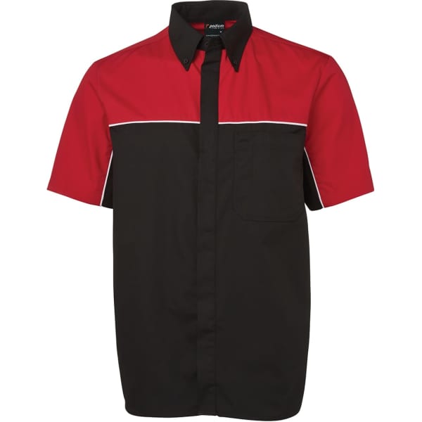 A short-sleeved shirt featuring black and red panels with a pocket and a logo.