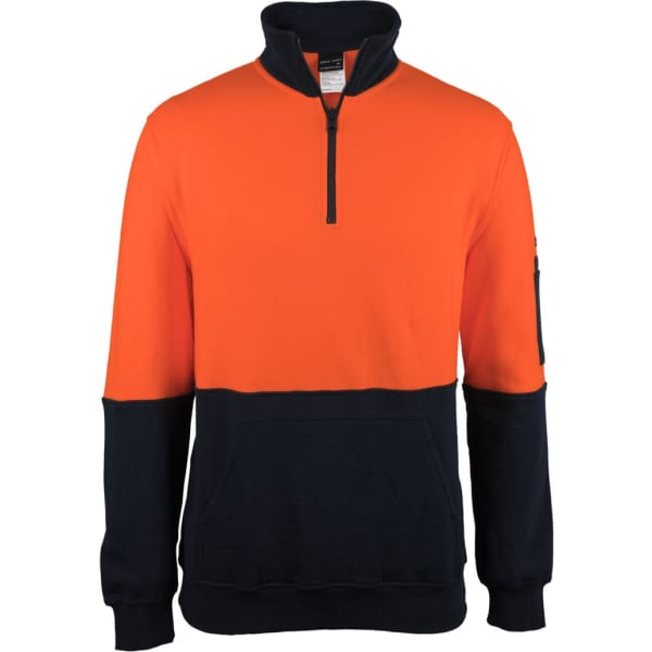 A half-zip fleece in orange and navy blue, featuring a pocket and a logo on the sleeve.