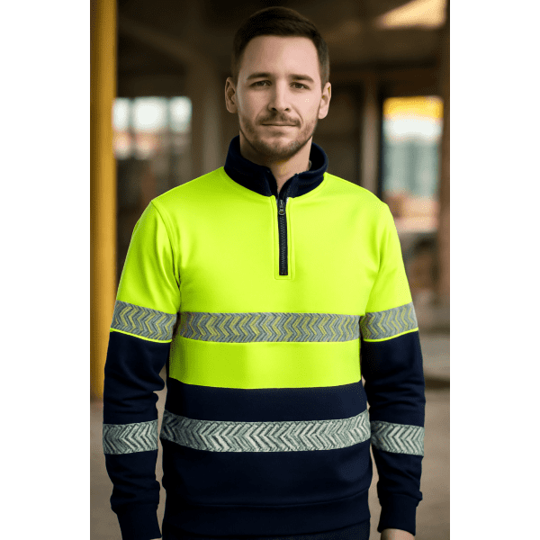 A high-visibility fleece pullover in yellow and navy with segmented reflective stripes and a half zip.