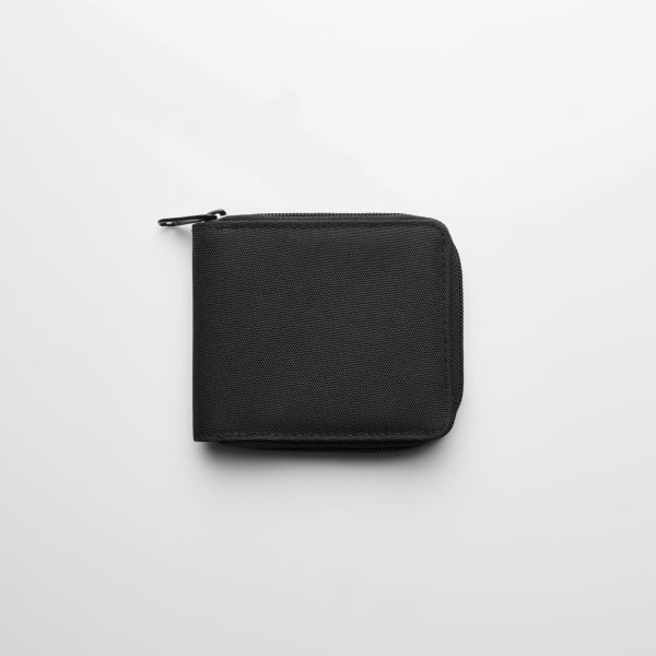 A black zip wallet with a textured fabric surface, featuring a zip closure and compact design.