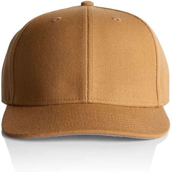 A tan cap with a structured front and a curved visor, featuring a branding logo on the side.