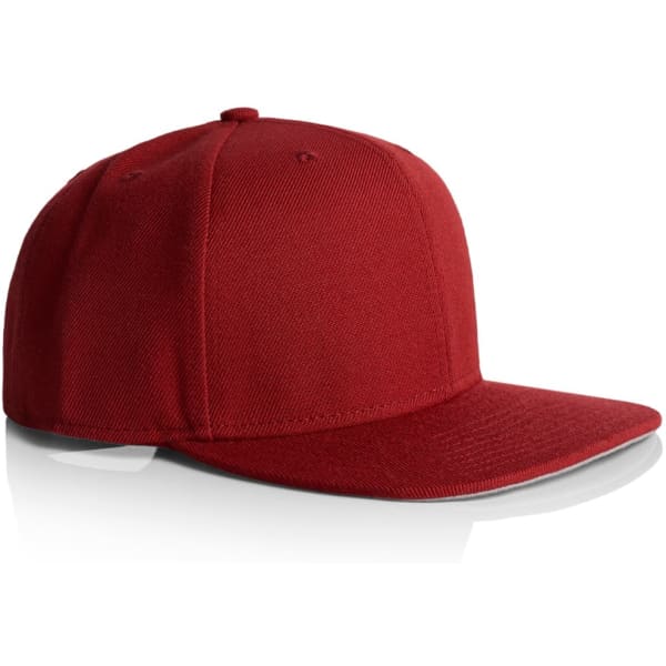 A red cap with a flat brim and structured design, featuring a logo on the front.