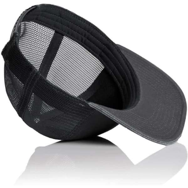 A black and grey trucker cap featuring mesh detailing and a logo on the front.