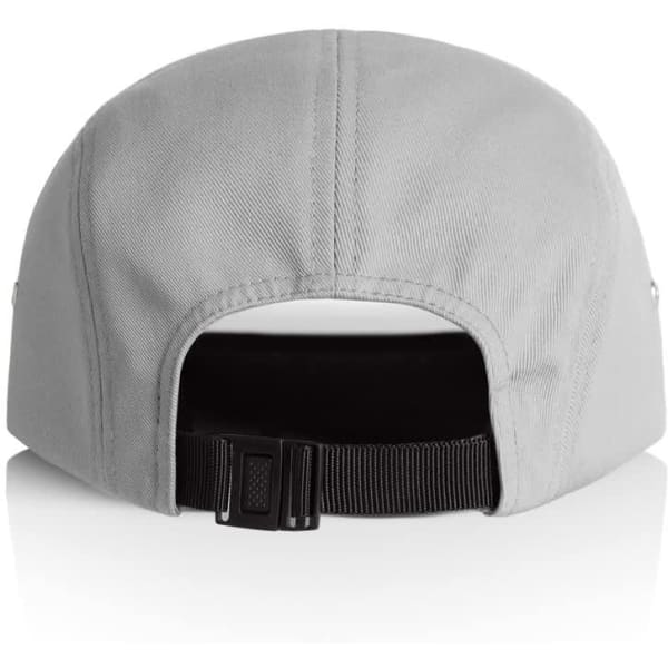 A grey five panel cap with a black adjustable strap at the back and a logo on the side.
