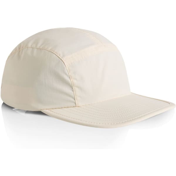 A light cream nylon cap with a structured design and a flexible brim. It features a logo on the side.