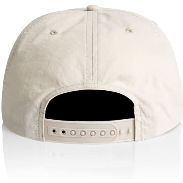 A cream-coloured cap with a flat brim and adjustable strap at the back, featuring a logo.