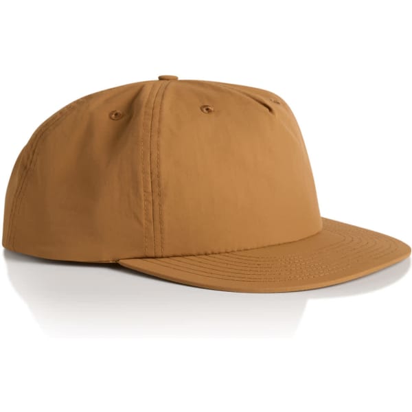 A tan surf cap with a flat brim and six-panel design, featuring a logo on the side.