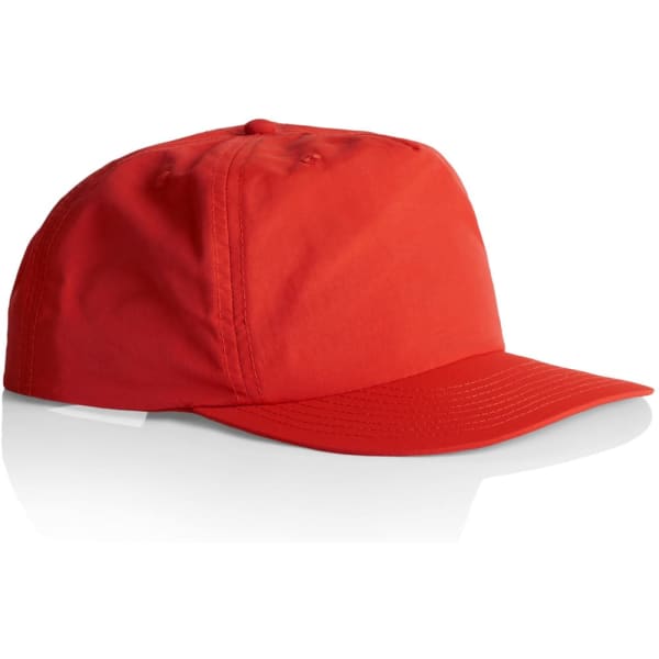 A red cap with a curved brim and a logo, displayed at an angle on a white background.